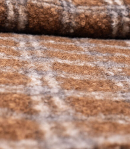 Tekstylia w kolorach ziemi – trend, który ociepla każde wnętrze